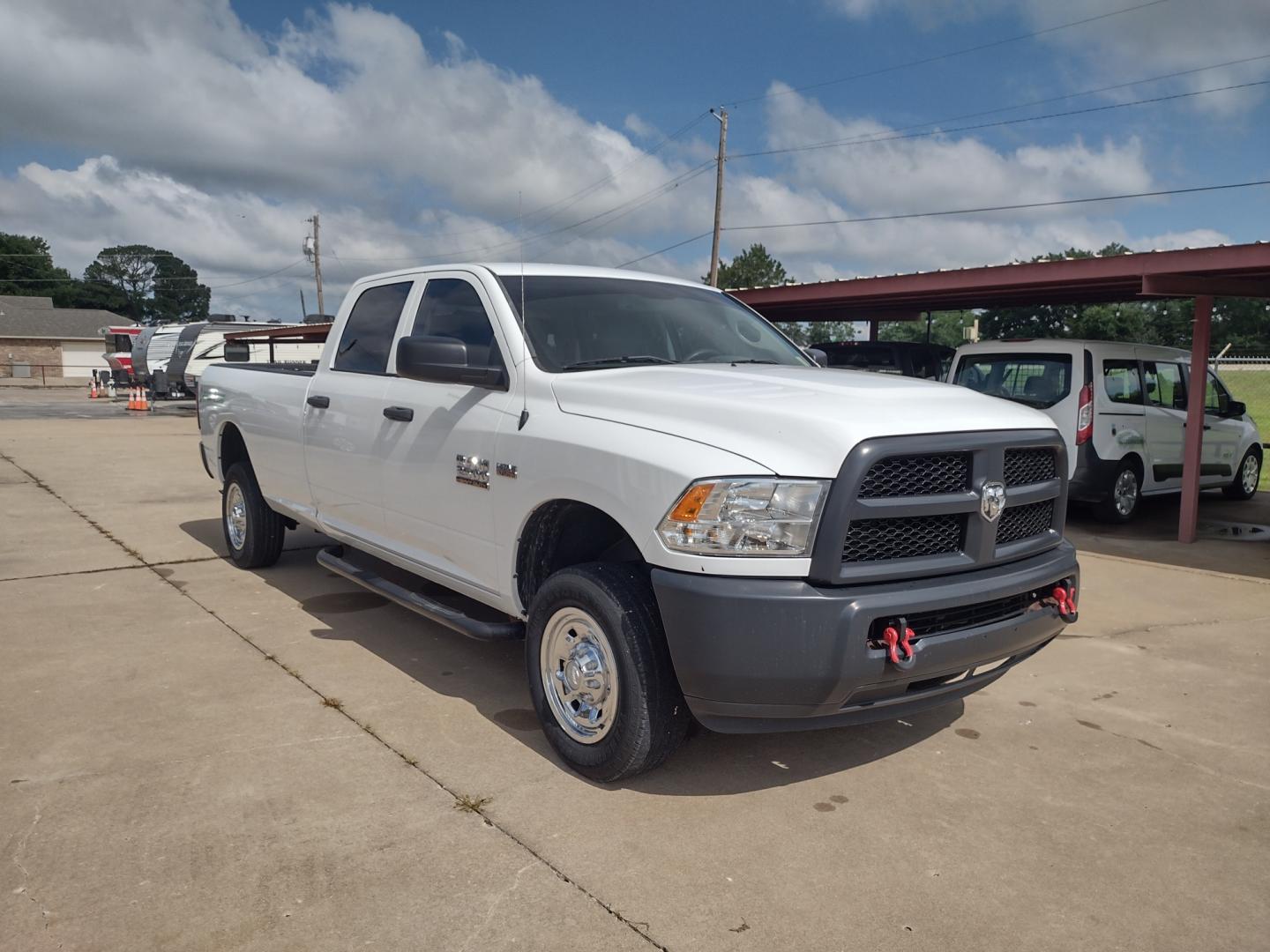 2017 White /Gray RAM 2500 TRADESMAN (3C6UR5H23HG) with an 5.7 engine, AUTOMATIC transmission, located at 17760 Hwy 62, Morris, OK, 74445, (918) 733-4887, 35.609104, -95.877060 - 2017 DODGE RAM 2500 HAS THE 5.7L ENGINE WITH A 8ft BED AND IS 4WD IT ALSO HAS TOW HOOKS. FEATURES POWER LOCKS, POWER WINDOWS, HAS AM/FM RADIO, AUXILLARY PORT, USB PORT, CRUISE CONTROL, MULTI-FUNCTION STEERING WHEEL CONTROLS, HAS 2 STORAGE COMPARTMENTS AND HAS A BACKUP CAMERA. EQUIPPED WITH A BI-FUE - Photo#1